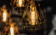 Close-up shot of a lightbulb illuminating a room