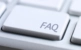 Image of a computer keyboard with a FAQ key.